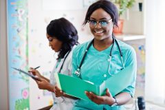 Two african american pharmacist working in drugstore at hospital pharmacy. African healthcare.