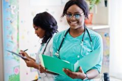 Two african american pharmacist working in drugstore at hospital pharmacy. African healthcare.